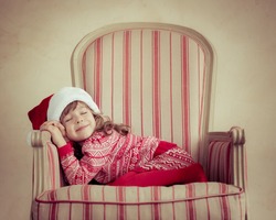 Child sleeping at home. Christmas dream. Xmas holiday concept