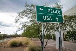 Signpost at the US-Mexican border