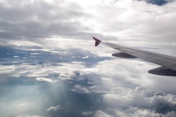 Clouds and planes from high angle of travel.