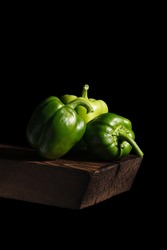 pepper green on a wooden board