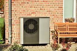 Air conditioner, Air-Air Heat Pump for Heating and hot Water in Front of an Residential Building