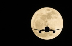 Silhouettes of Aircraft and super moon, Full moon