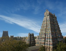 Meenakshi hindu temple in Madurai, Tamil Nadu, South India. Sculptures on Hindu temple gopura (tower).