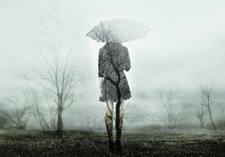 Woman with umbrella standing on the field with trees. The image with the effect of double exposure