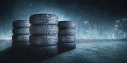 Car tires on wet roadway