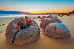 Unreal Moeraki Boulders at sunrise, Koekohe beach,Otago, South Island, New Zealand
