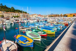 Nice port with boats and yachts. Nice is a city located on the French Riviera or Cote d'Azur in France.
