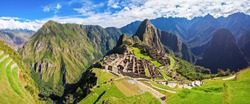 Panorama of the Machu Picchu or Machu Pikchu panoramic view in Peru. Machu Picchu is a Inca site located in the Cusco Region in Peru. Machu Picchu is one of the New Seven Wonders of the World.