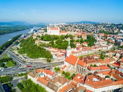 Bratislava Castle or Bratislavsky Hrad and St. Martin Cathedral aerial panoramic view. Bratislava is a capital of Slovakia.