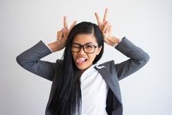 Young Asian Business Woman Making Faces