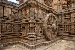 Large stone wheel with carvings at Konark Sun temple at Puri Odisha, India