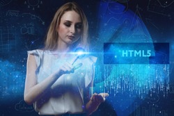 The concept of business, technology, the Internet and the network. A young entrepreneur working on a virtual screen of the future and sees the inscription: HTML5