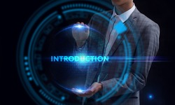 Business, Technology, Internet and network concept. Young businessman working on a virtual screen of the future and sees the inscription: Introduction