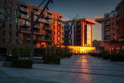 Street with new apartments in Gdansk at sunrise, Poland