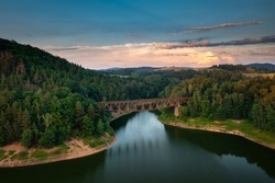 Old steel railway bridge over Lake Pilchowickie in Poland. Lower Silesia
