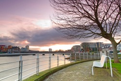 Empty bench at Shannon river, Limerick, Ireland