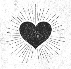 Heart symbol with sunburst on grunge background 