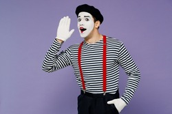 Young mime man with white face mask wears striped shirt beret scream hot news about sales discount with hands near mouth look camera isolated on plain pastel light violet background studio portrait