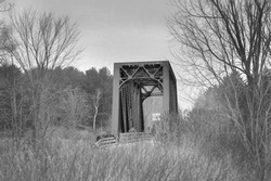An old abandoned CN iron railway truss bridge outside of Ottawa, Canada