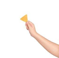 Hand holding crispy corn nachos  isolated on white background.