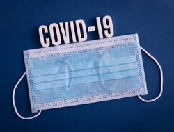 COVID-19 coronavirus sign lettering on a colored background.