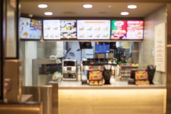 defocus of Fast food restaurant, burger shop store interior, abstract blur background