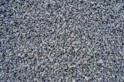 Abstract stone texture. Fine gray gravel. Small gray stones.  Building material