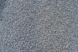 Abstract stone texture. Fine gray gravel. Small gray stones.  Building material