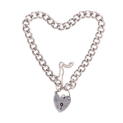 Vintage Silver Charm bracelet in heart shape with padlock against white background.