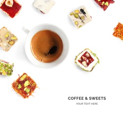 Creative layout made of turkish delights and turkish coffee on white background. Flat lay. Food concept. Macro concept.