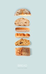 Creative layout made of bread on the blue background. Flat lay. Food concept.