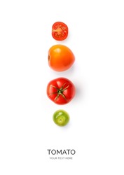 Creative layout made of tomatoes  on the white background. Flat lay. Food concept.