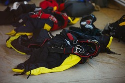 Parachute wingsuit and other skydiving equipment, close-up.