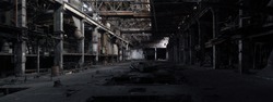Panorama of an unlit abandoned interior in a closed bankrupt factory. High resolution and detail.