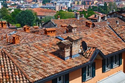 View of the old redroof of the historical buildings in the Bergamo in northern Italy. Bergamo is a city in the Lombardy region. 