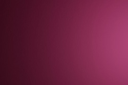 Paper texture, abstract background. The name of the color is maroon. Gradient with light coming from right
