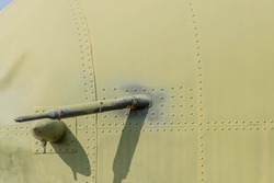Closeup of port side pitot tube on decommissioned military cargo aircraft.
