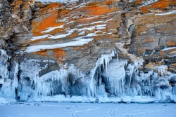 Bizarre ice figures on the coastal cliffs of Lake Baikal. Irkutsk region, Russia