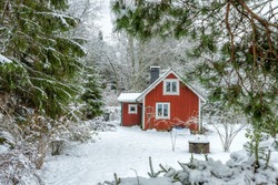 Idyllic Swedish house in winter scenery