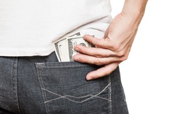Human hand holding dollar currency cash taking banknote out of jeans pocket