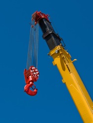 Building crane boom with steel hook