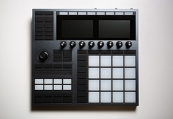 Drum machine for hip hop beat maker. Professional pad controller device for electronic music production. Curated collection of royalty free music images and photos for poster design template