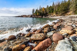 Little Hunters Beach is a secluded cobblestone beach in a tiny cove just off the Park Loop Road in Acadia National Park on Mt. Desert Island in Down East Maine.