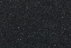 Black granite texture for backgrounds and overlays. High resolution photo.