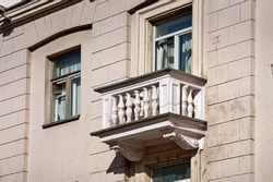 Balcony with with balustrade, old residential building. Stalinist architecture, building on Independence Avenue in Minsk. Stalin Empire style. Balcony of soviet building