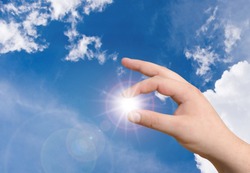 hand holding the sun