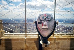 Tourist binoculars at the top of the Empire State Building in New York City