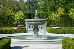 The fountain in the garden in the style of renaissance.