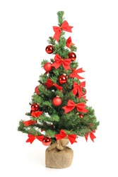 Christmas tree with red ornaments isolated on white