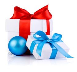 Two White boxs tied with a satin ribbon bow and blue Christmas balls Isolated on white background
